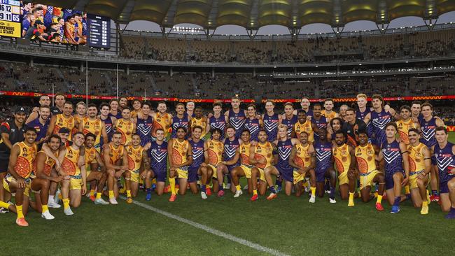 The All Stars and Dockers come together after the match. Picture: Michael Klein