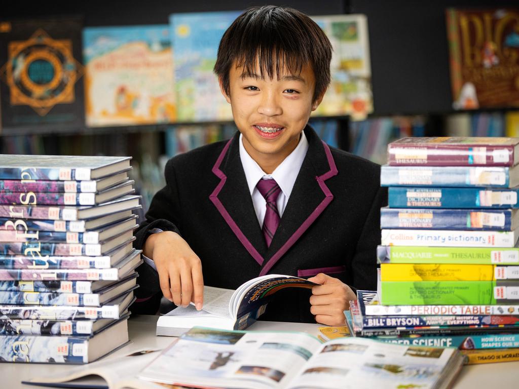 MELBOURNE, SEPTEMBER 13, 2022: Zachary Cheng, 13, is the national winner of the Prime Minister's Spelling Bee in the Year 7-8 age group. He'll be going to Canberra to meet the Prime Minister as part of his prize. Picture: Mark Stewart