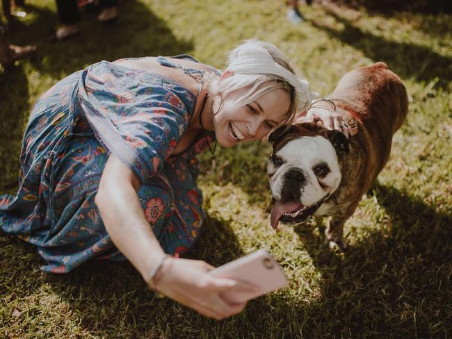 Selfies are always in order especially with Zeppelin the English bulldog who was at his owners’ Brooke and Ben Heath’s wedding. Picture: Joel Alston