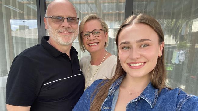 Bryony Baker, pictured with her parents Sue and Paul, says one teacher helped her turn study around after an ADHD diagnosis. Picture: Supplied