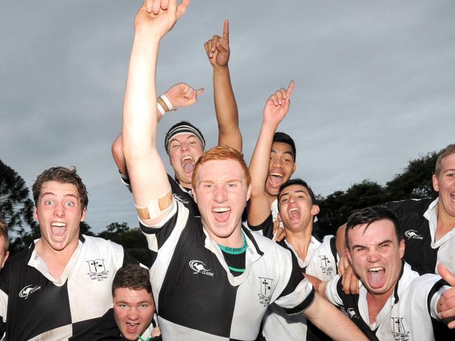 AIC premiers  Iona College. they won 95-3 over Padua College. Captain  Brad Wilkin leads the victory celebrations.