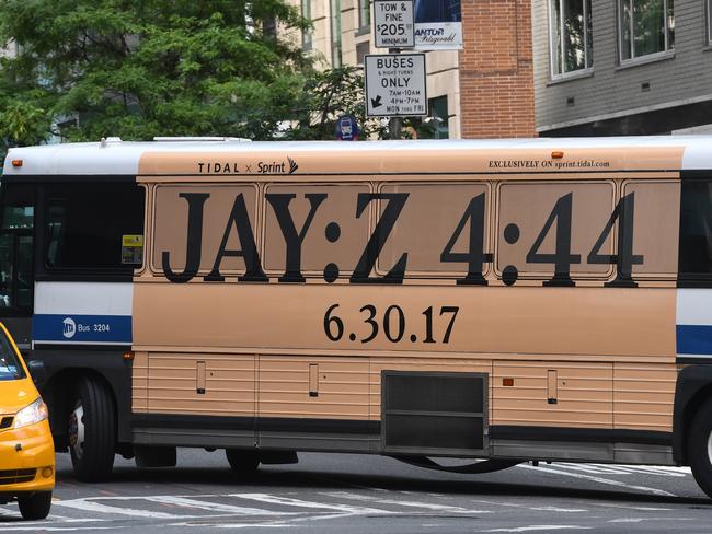 A New York City bus advertises Jay-Z’s latest album 4:44, which dropped overnight. Picture: AFP/ Timothy A. Clary