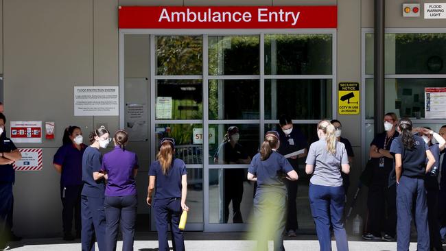 Health workers outside St Vincent’s Hospital in Darlinghurst, Sydney. Picture: NCA NewsWire / Damian Shaw