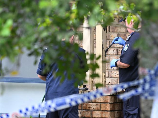 Police at the home where Emma Lovell was stabbed to death, and her husband Lee injured during a violent home invasion. Picture: Lyndon Mechielsen