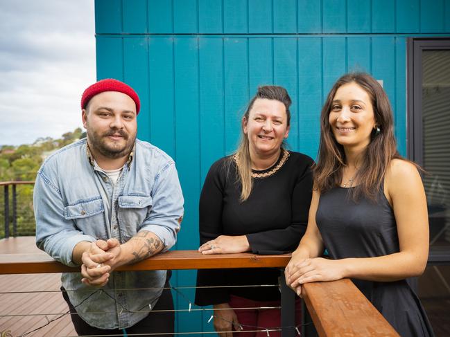 Author Madeleine Rojahn, right, with graphic designer/photographer Joshua Quigley and former refugee Jelena Djekanovic. Madeleine is working on a book about refugees in Tasmania. Picture: RICHARD JUPE