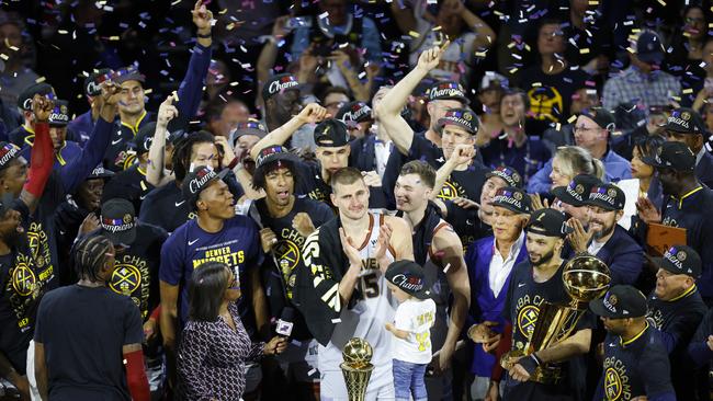 The Nuggest appear to have had “NBA Champions” on their shirts after winning last year. Photo by Justin Edmonds/Getty Images