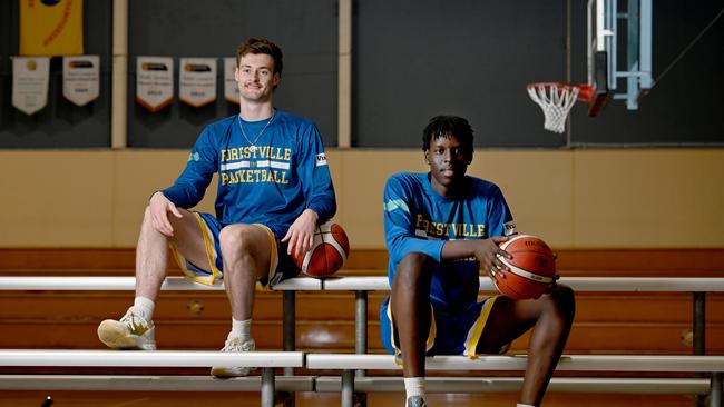 Eagles teammates Malith Machar (right) and Michael Harris at Wayville Stadium. The basketball will not be allowed many spectators, while 15,000 people are allowed a the football. Picture: Naomi Jellicoe