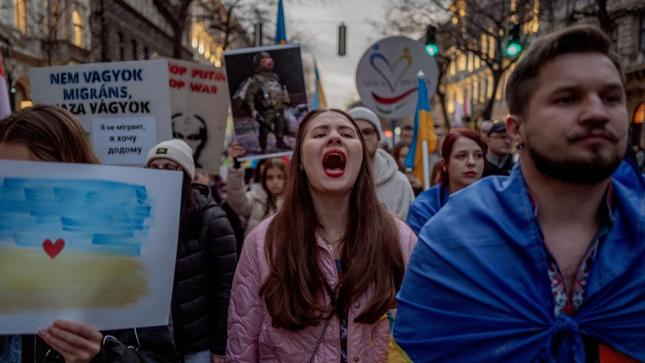 Ukrainian civilians march in Budapest, Hungary, one year on since Russia's full scale military invasion of Ukraine. Picture: Janos Kummer/Getty Images