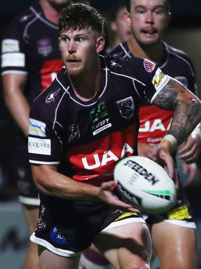 Burleigh Bears halfback Guy Hamilton looks to pass. Photo Jason O'Brien