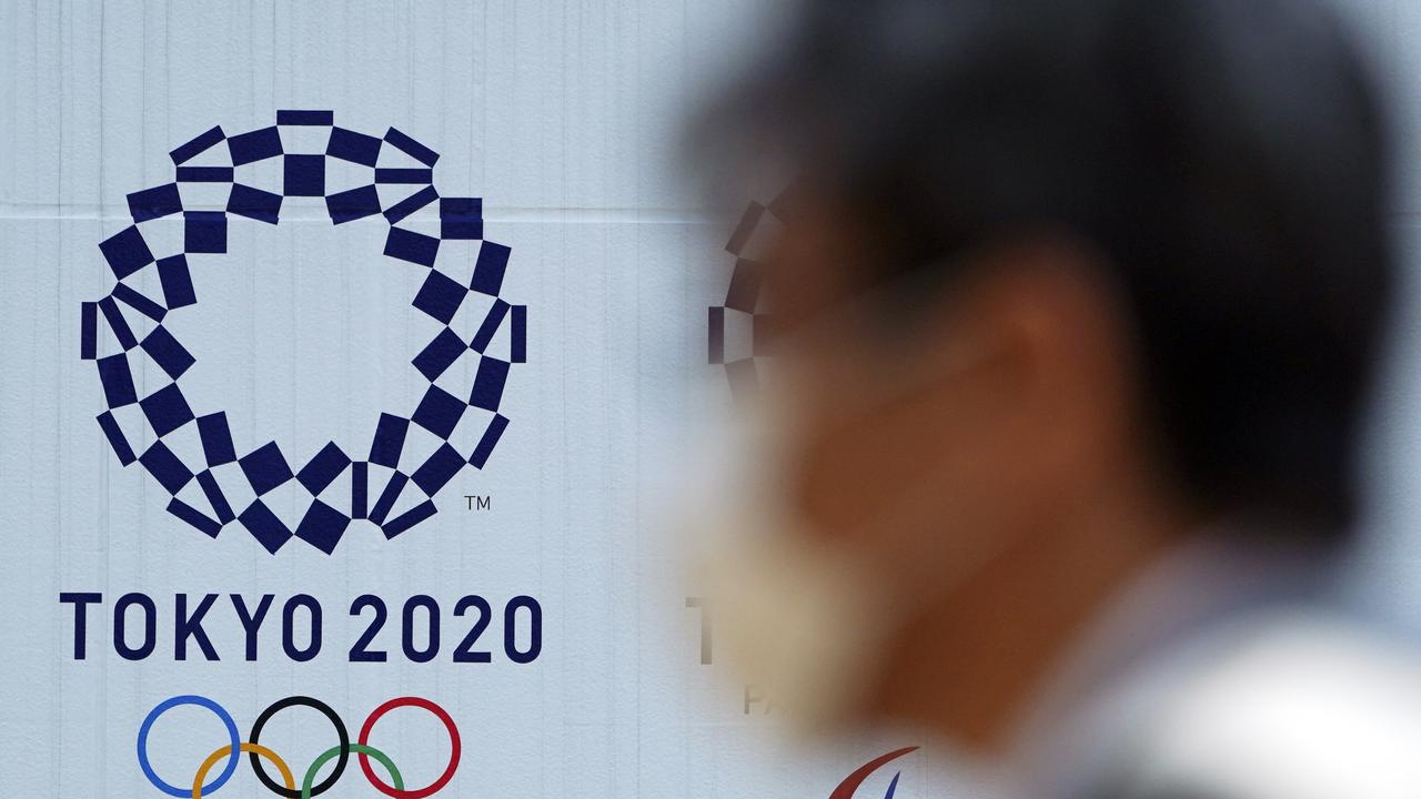 Russia wants to use coronavirus to get back into the Olympics. (AP Photo/Eugene Hoshiko)