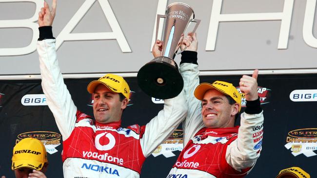 Jamie Whincup and Craig Lowndes celebrate winning the 2008 Bathurst 1000.