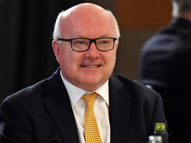 Attorney-General George Brandis has outlined a plan to overhaul foreign interference and espionage laws this year. Picture: AAP Image/Mick Tsikas