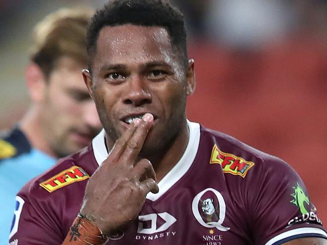 BRISBANE, AUSTRALIA - FEBRUARY 19: Filipo Daugunu of the Reds celebrates a try during the round one Super Rugby AU match between the Reds and the Waratahs at Suncorp Stadium, on February 19, 2021, in Brisbane, Australia. (Photo by Jono Searle/Getty Images)