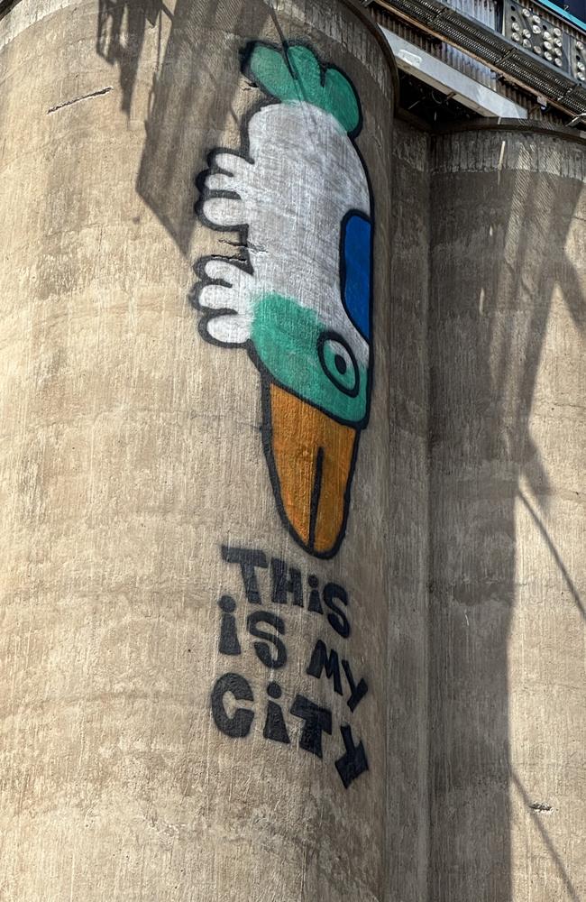 Pam the Bird art on silos in Geelong CBD.