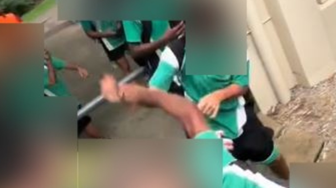 Watch: Teachers shoved in wild schoolyard brawl