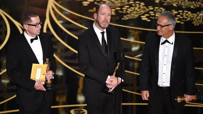 Ben Osmo (right) with colleagues Gregg Rudloff, Chris Jenkins and Ben Osmo accepting the Best Sound Mixing award for'Mad Max: Fury Road. Picture: Getty