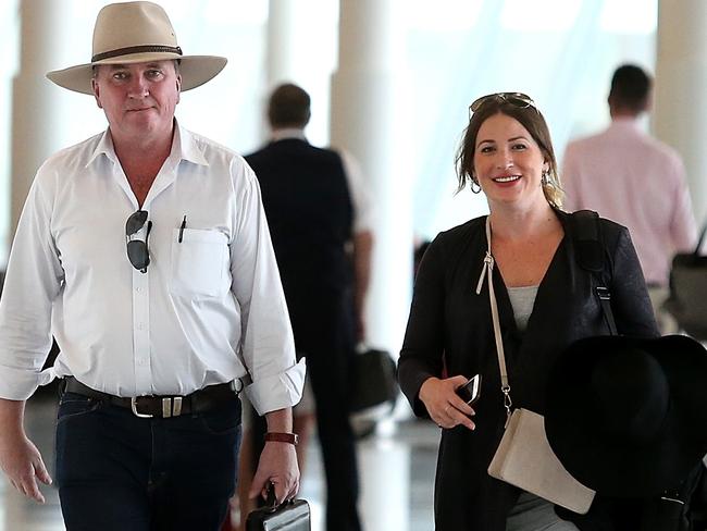 Former Deputy Prime Minister Barnaby Joyce and his pregnant partner Vikki Campion pictured at Canberra airport. Picture: Kym Smith