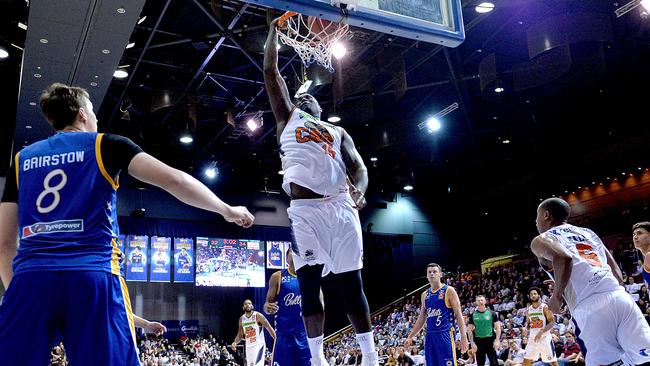 BRISBANE, AUSTRALIA — OCTOBER 13: Nate Jawai of the Taipans slam dunks during the round one NBL match between the Brisbane Bullets and the Cairns Taipans at Brisbane Convention &amp; Exhibition Centre on October 13, 2018 in Brisbane, Australia. (Photo by Bradley Kanaris/Getty Images)