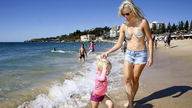 Amber Delisser and her daughter Eve Delisser, 2, at Coogee beach. The Department of Environment has downgraded the quality of Coogee beach in their annual report of beach quality, to 'poor'. Picture: John Appleyard