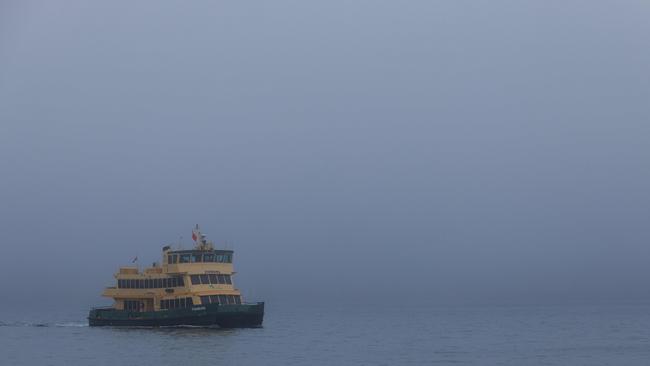 A thick Sydney fog has stopped the ferries on the harbour. Picture: NCA NewsWire / David Swift