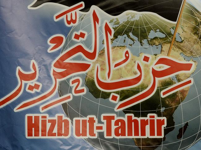 The Hizb ut-Tahrir banner. Hizb ut-Tahrir release their report into Government Intervention into the Muslim Community at  a press conference at the Sebel, Surry Hills. Picture: John Appleyard