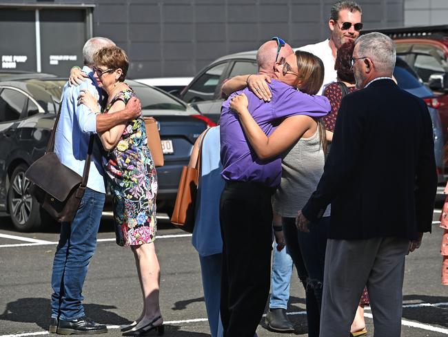 Family console each other after a boy accused of causing the death of a church pastor, dancer and nurse in a horrific triple-fatal crash in Queensland’s Fraser Coast region was sentenced. Picture: NewsWire / John Gass