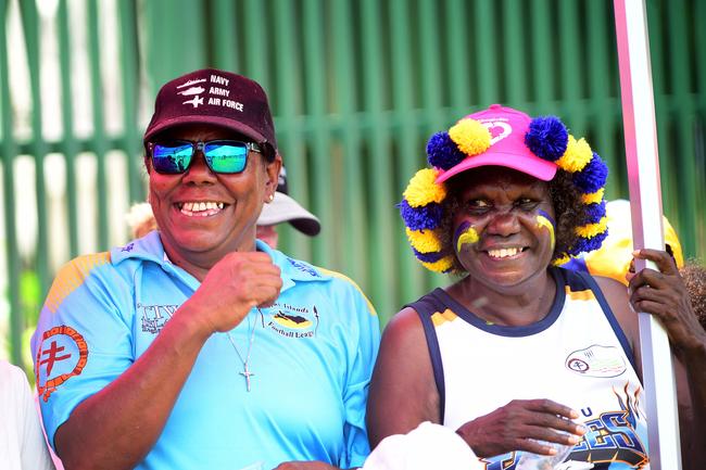 Tiwi women Mary Dunn and Tersia Portaminny were just some of the many thousands of spectators that made the trip north for a mix of art and footy during this year's 49th Annual Tiwi Grand Final on Bathurst Island, 80km's north of Darwin, NT. Picture: Justin Kennedy