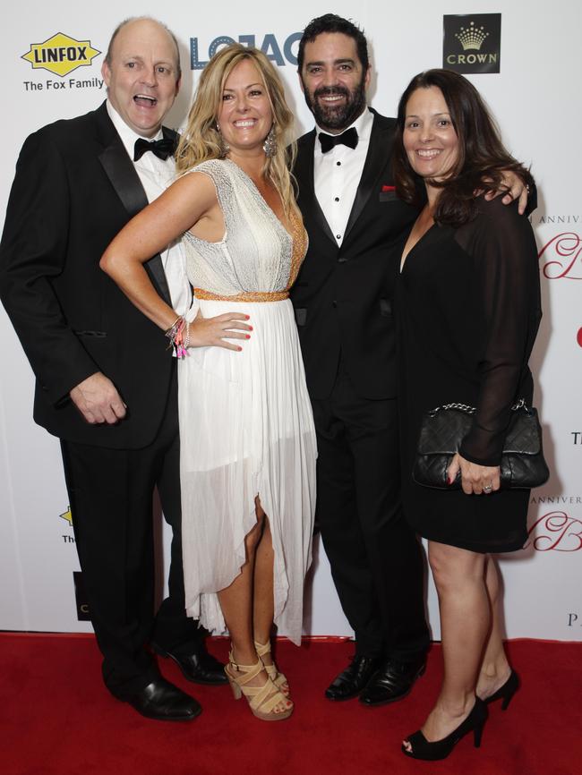 Red Ball. Billy Brownless and his wife Nikki, and Garry Lyon and his wife Melissa.