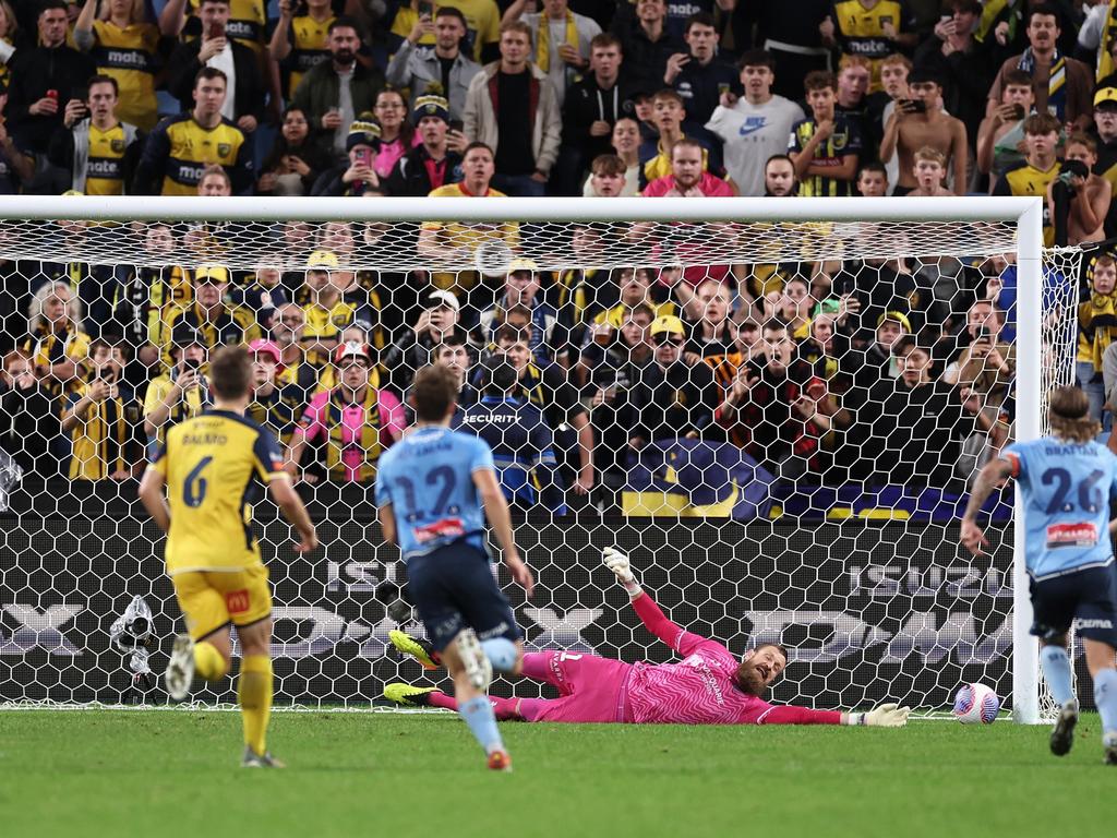 Mikael Doka of the Central Coast Mariners scores a penalty goal past Andrew Redmayne of Sydney FC. Picture: Getty