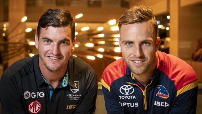 Tom Rockliff and Brodie Smith said they’re eager to play anywhere at anytime. Picture: AAP/Mike Burton.