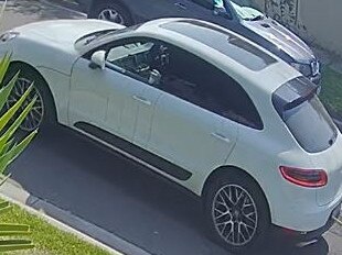Police are searching for a white Porsche Macan stolen from Coburg North on Christmas Day.