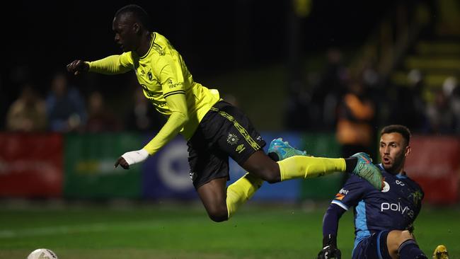 Sebit Ngor in action at Heidelberg United on loan from Central Coast Mariners.