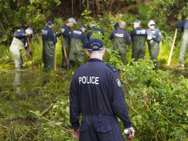 NSW Police search bushland at Batar Creek in NSW, Thursday, June 28, 2018. Search teams looking for evidence in the William Tyrrell case entered their second day of searching in an area of NSW bushland, about four kilometres from where the three-year-old boy was last seen nearly four years ago. The new search area is a six-minute drive from William's foster grandmother's yard in the NSW mid-north coastal town of Kendall, where the boy vanished in September 2014. (AAP Image/Shane Chalker) NO ARCHIVING