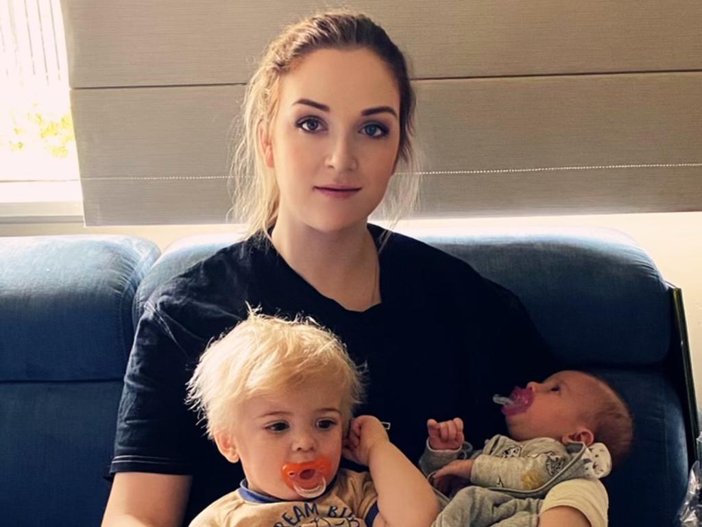 Jenna Allen (pictured with her two children) was bitten by a redback spider while volunteering for the CFA has been fighting an lived with a massive inflamed and pus ridden wound that stretches from her wrist to her elbow. Picture: supplied