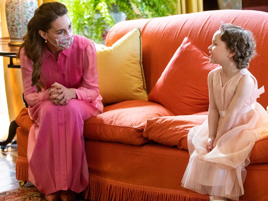 Kate keeps her promise to meet Mila Sneddon, a cancer patient who featured in an image from the Hold Still photography project. Picture: Jane Barlow/AFP