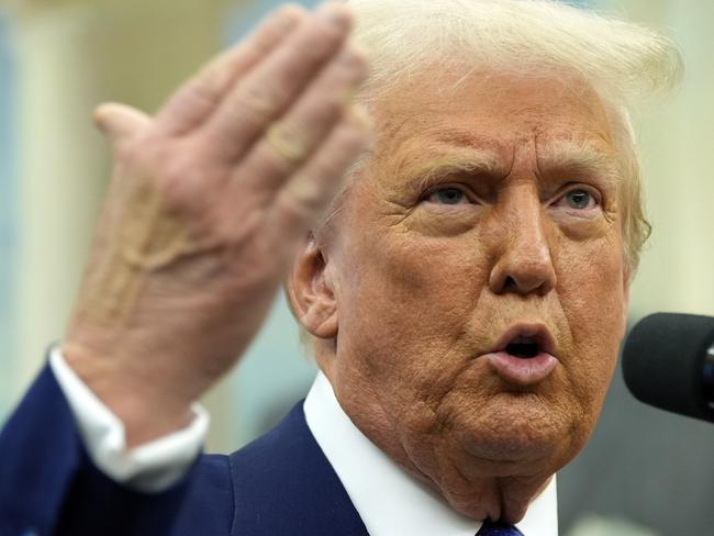 President Donald Trump speaks as Tulsi Gabbard is sworn in as the Director of National Intelligence in the Oval Office of the White House, Wednesday, Feb. 12, 2025, in Washington. (Photo/Alex Brandon)