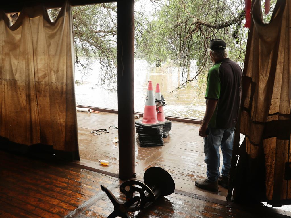 Camden a day after another flood in the area in two weeks .Phil Oliver ( cap) sevens damage on his property at 2 Exeter st Camden.