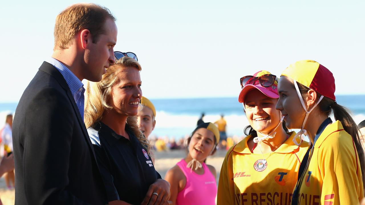 Prince William and Australian Olympian and surf lifesaver Naomi Flood meet with surf lifesavers at Manly Beach on April 18, 2014 in Sydney. Picture: Cameron Spencer/Getty Images