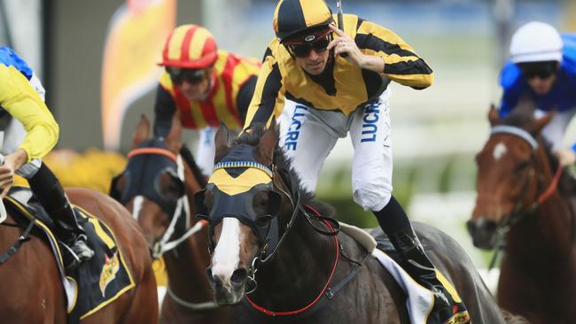 Tye Angland salutes the crowd after Trapeze Artist secured his third Group 1 of the season on Saturday. Picture: Getty Images