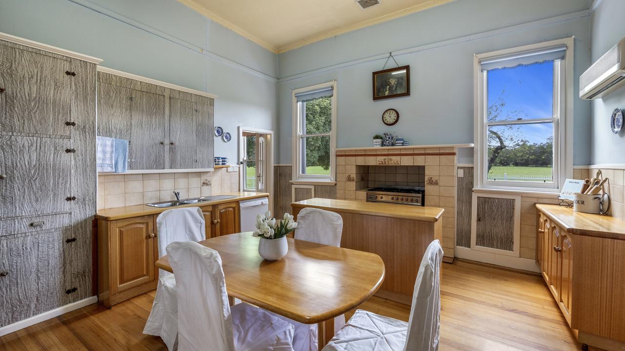 The spacious kitchen with modern appliances and plenty of storage.