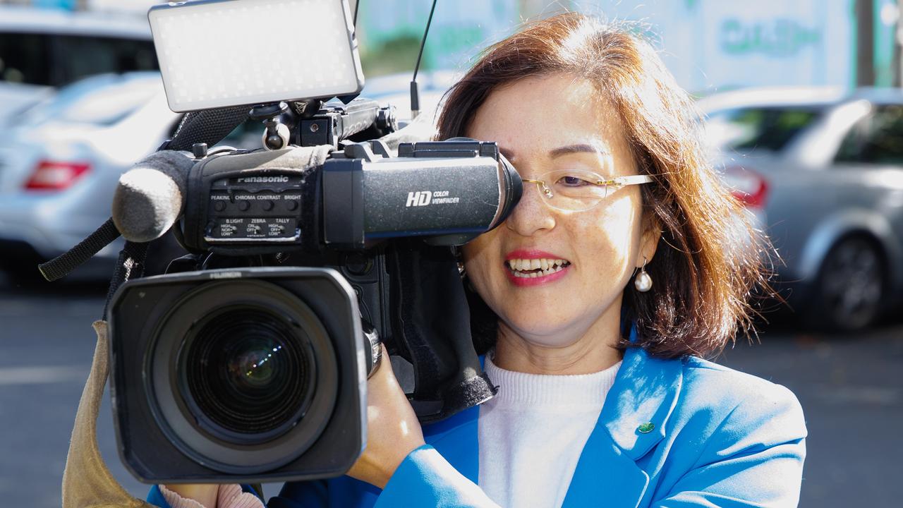 Gladys Liu MP, Federal Member for Chisholm, tries out the other side of the camera. Picture: Jason Edwards