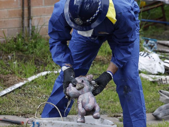 DAILY TELEGRAPH 10TH JULY 2024Pictured at 33 Freeman Street Lalor Park in Sydney are forensic police sifting through remains of a deliberately lit house fire that claimed 3 childrens lives.Picture: Richard Dobson