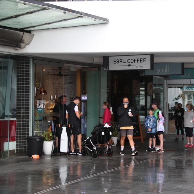 Day three of the Gold Coast lockdown.Large queue for Coffee at Surfers Paradise. . Picture Glenn Hampson