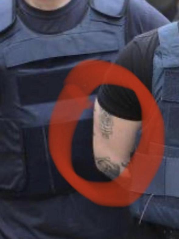 A tattoo on the arm of Yuliyanov J Raychev Serafim, which sources claim shows the insignia of the Outlaws motorcycle gang.