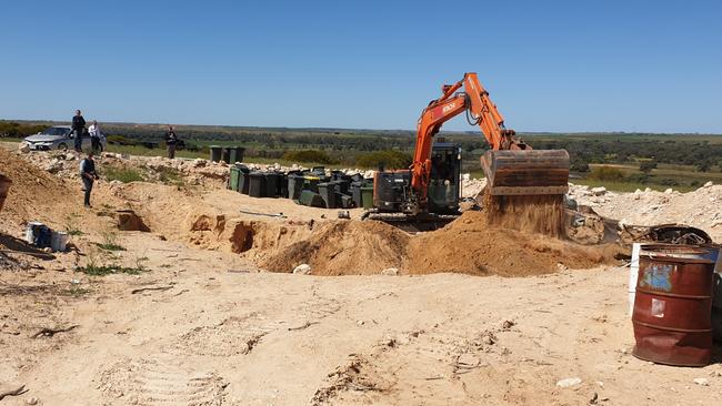 Police search a Ponde property, linked to the Hells Angels, for evidence related to two murder inquiries. Picture: SAPOL