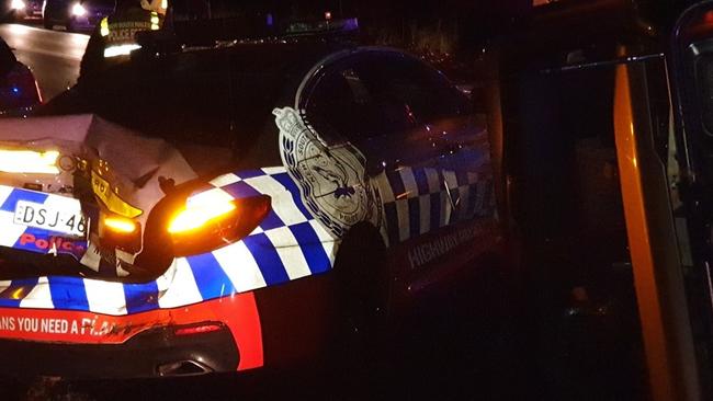 The two officers were taken to hospital with suspected neck injuries. Picture: NSW Police