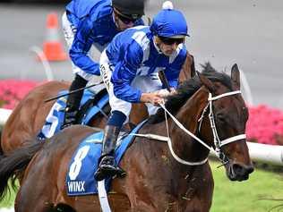 CHAMPION: Hugh Bowman rides Winx during the Cox Plate. Picture: JULIAN SMITH