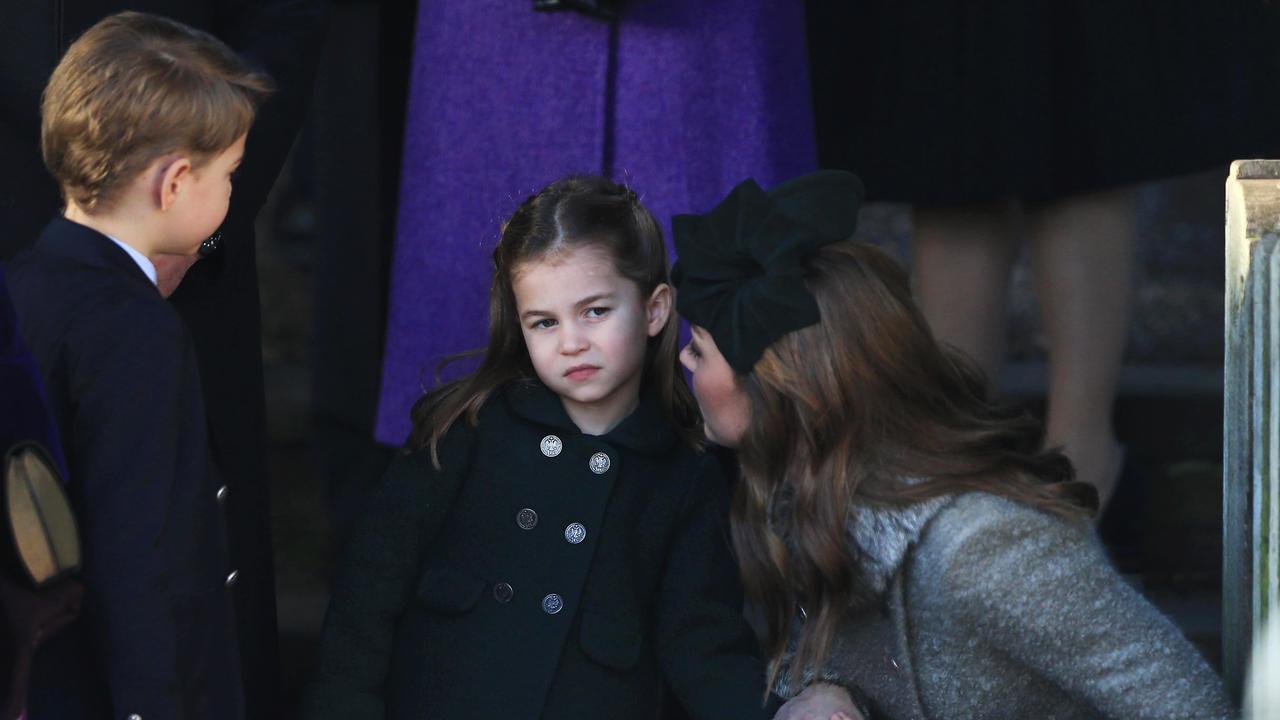 Catherine, Duchess of Cambridge speaks to Princess Charlotte as Prince George watches as they leave after attending the Christmas Day Church service. Picture: Stephen Pond/Getty Images