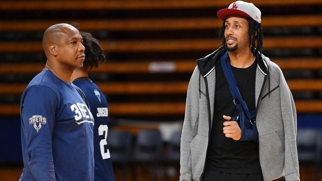 Coach Joey Wright and star import Josh Childress, who has been ruled out of the grand final series with a fractured shoulder, at training on Tuesday. Picture: David Mariuz (AAP).