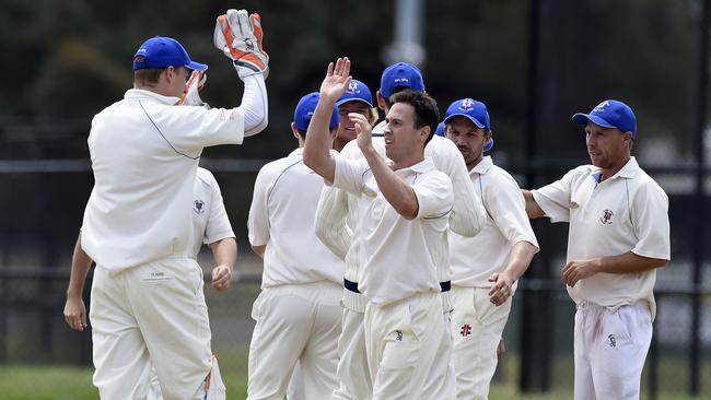 MPCA Provincial - Long Island v Peninsula Old Boys. Long Island's bowler Scott Phillips celebrates a wicket with team-mates.  Picture: Andy Brownbill